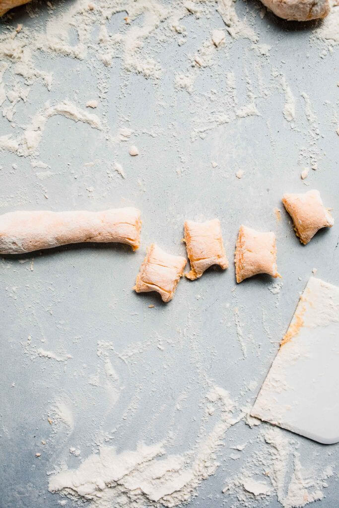 sweet potato gnocchi cut into pieces.