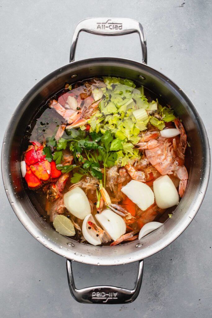 Seafood stock in pot.