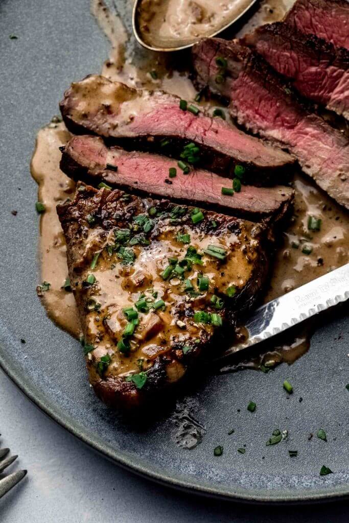 Close up of sliced steak diane. 