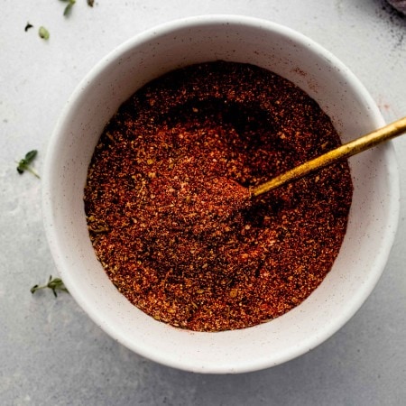 Cajun seasoning in small bowl.