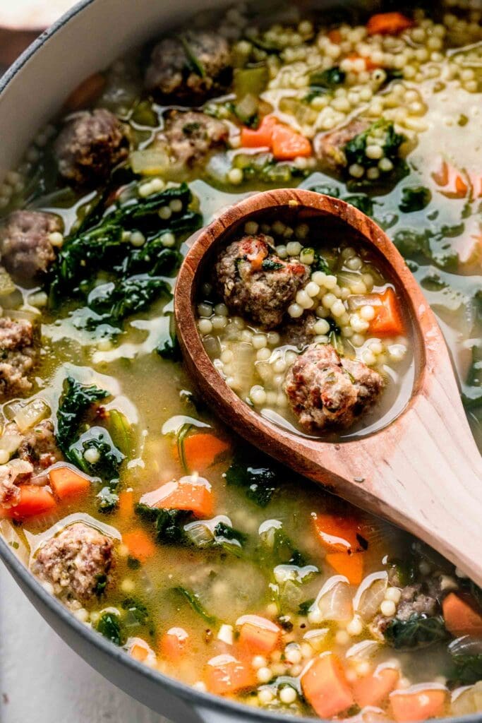 Ladle in pot of wedding soup. 