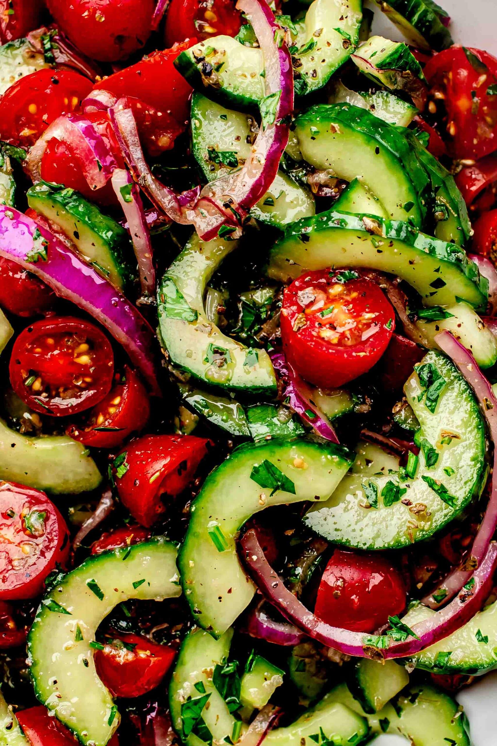 Overhead close up of tomato cucumber salad.