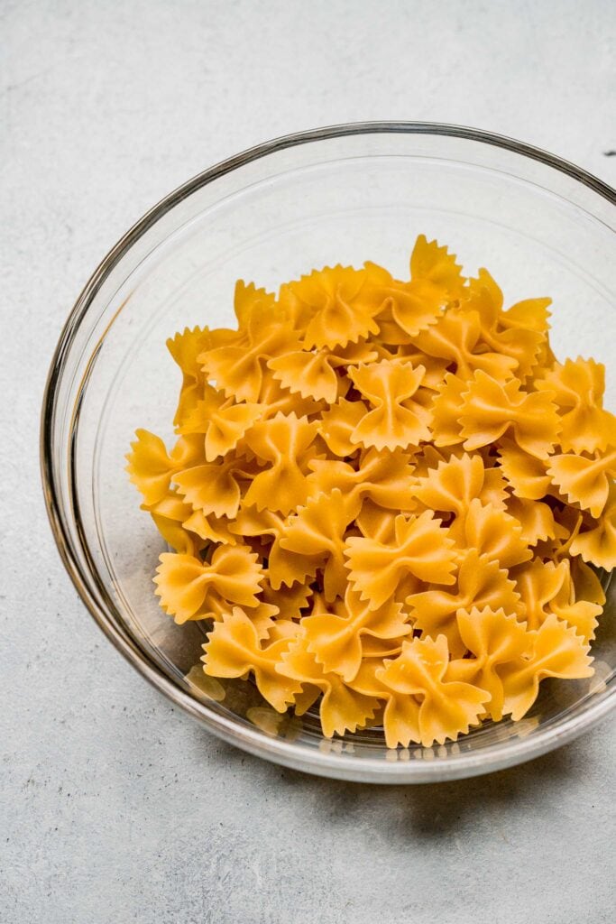 Farfalle pasta in glass bowl. 