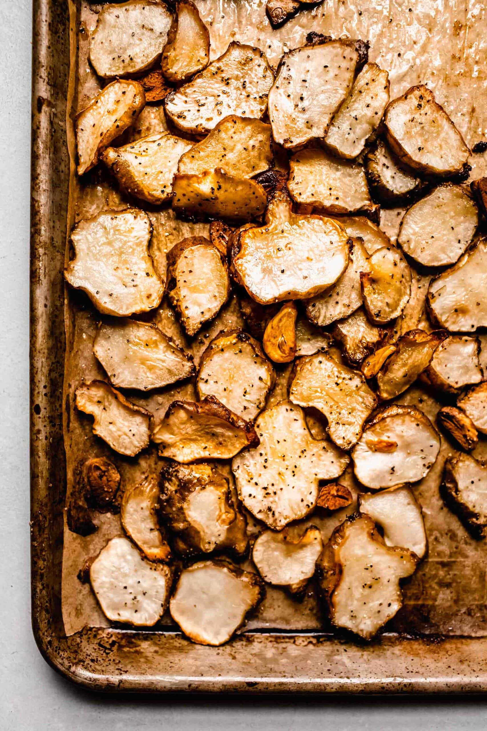 Roasted sunchokes on baking sheet. 