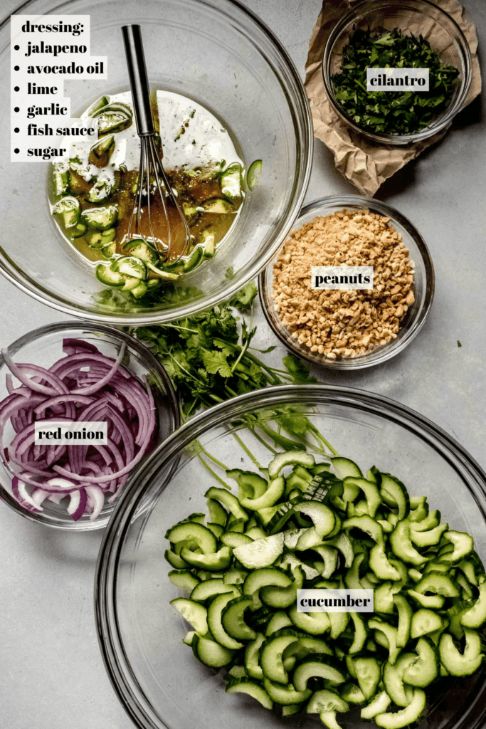 Ingredients for Thai cucumber salad on counter labeled with text overlay. 