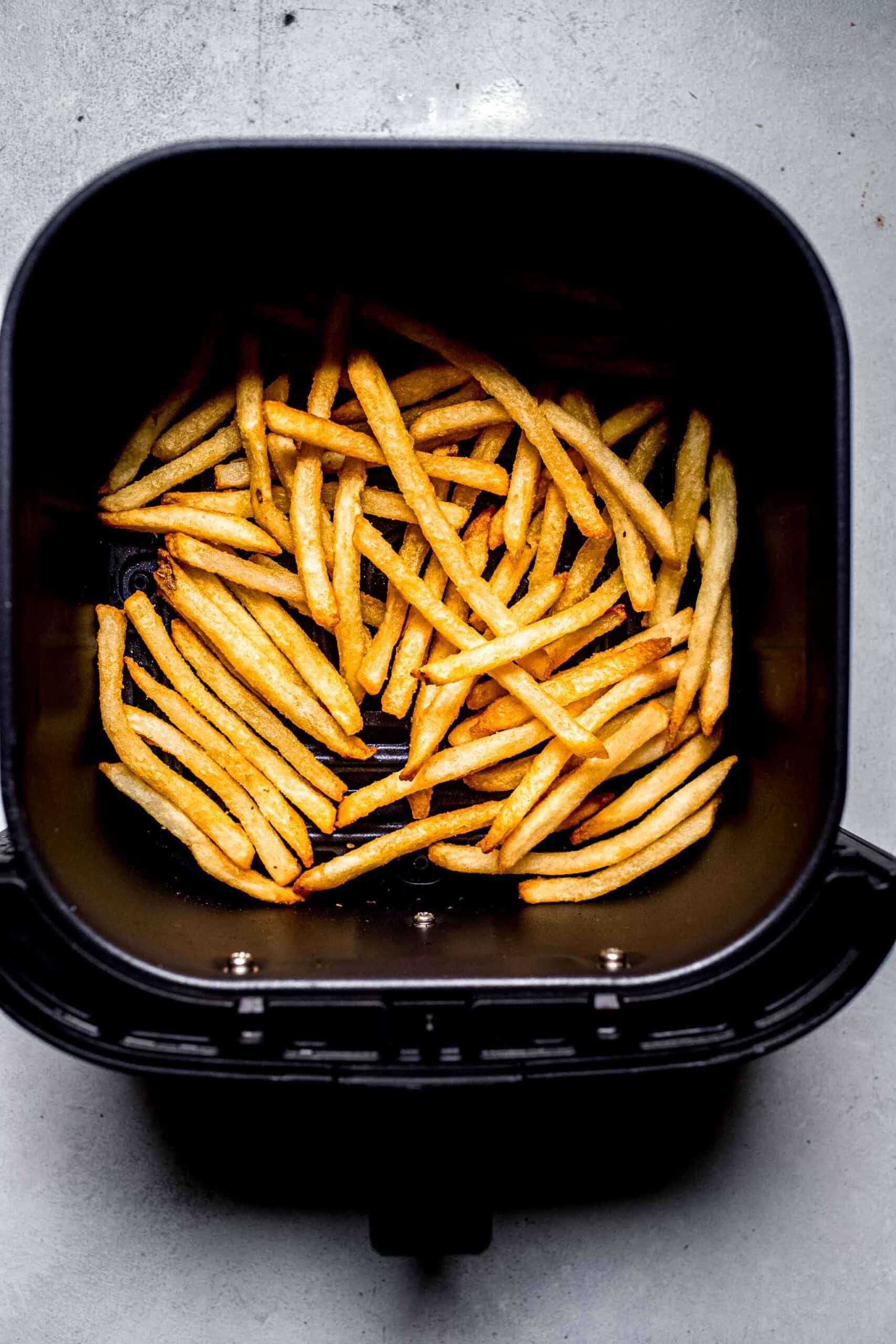 Cooked french fries in air fryer. 