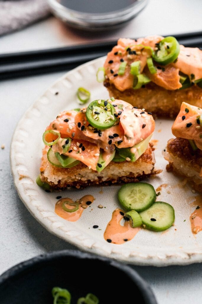 Side view of sushi bites o plate. 