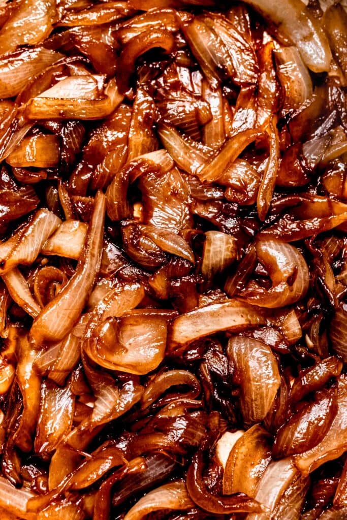 Extreme close up of caramelized sauteed onions.