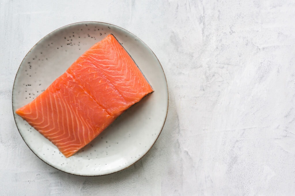 Salmon filet in serving dish.