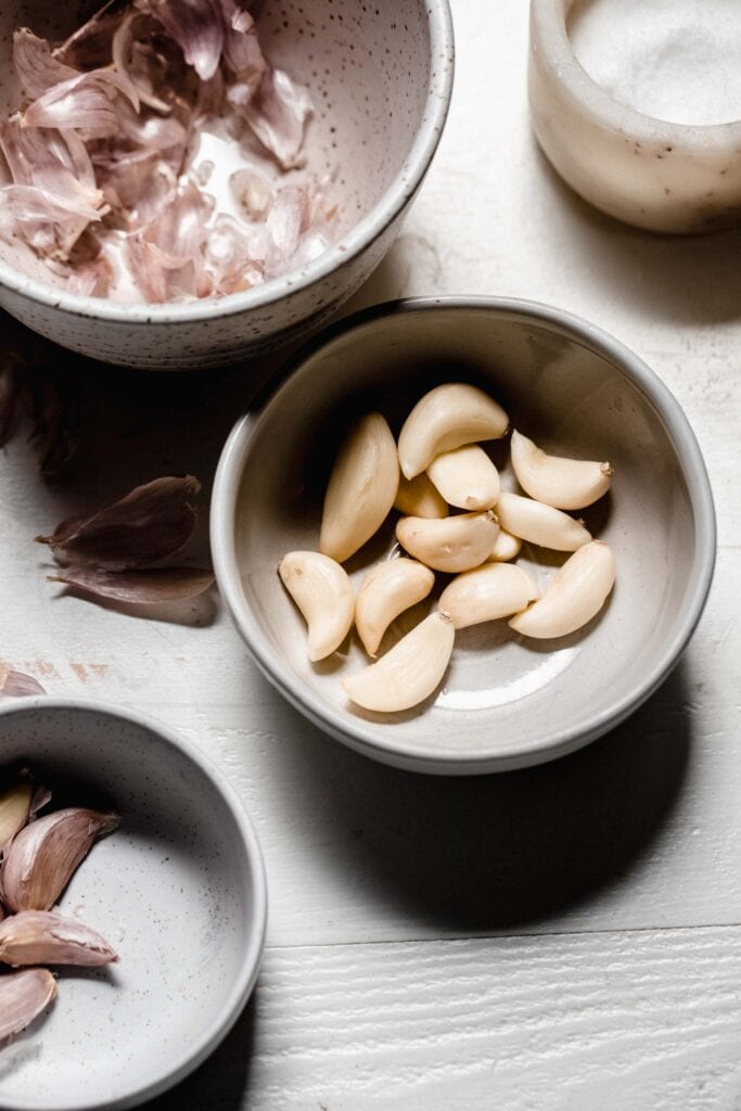 Bowl of peeled garlic cloves