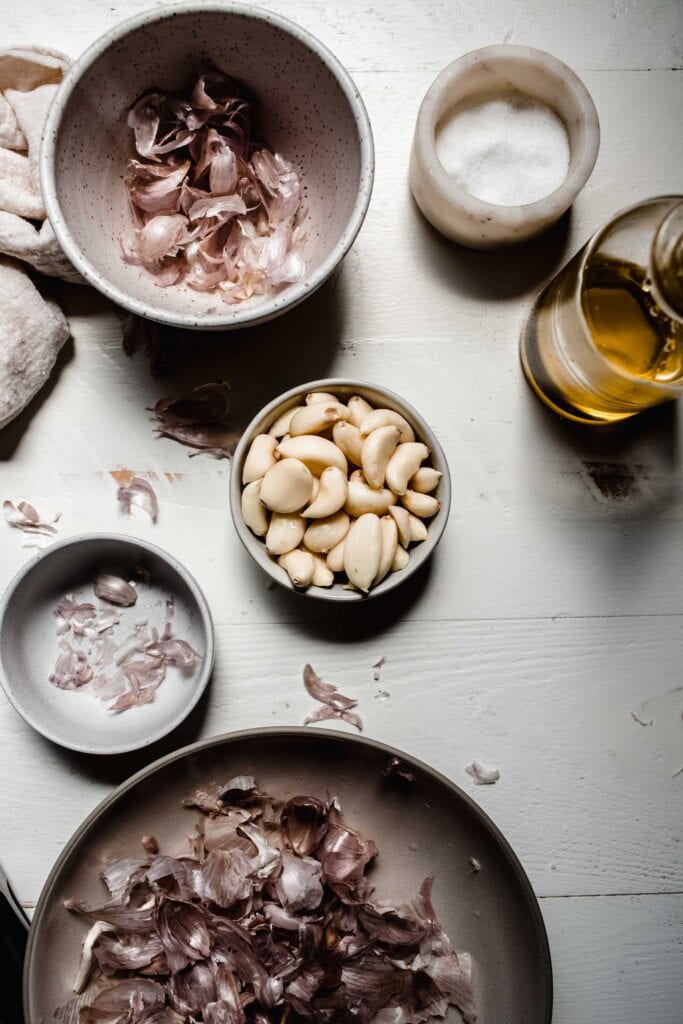 Ingredients for lebanese garlic sauce laid out on counter. 