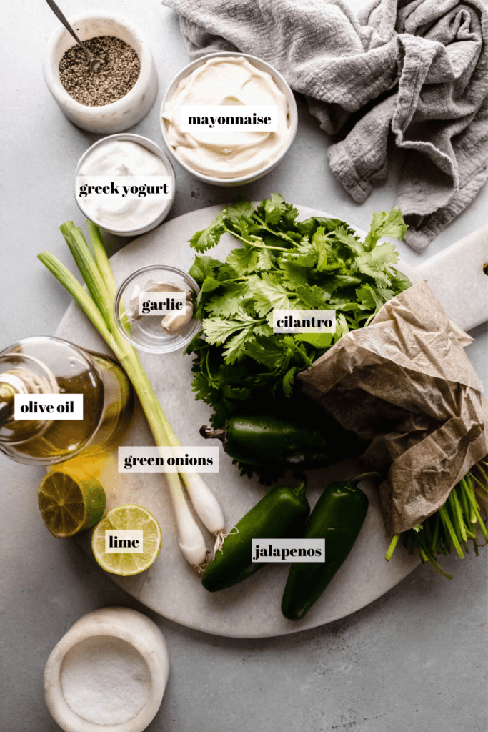 Ingredients for peruvian green sauce labeled on counter.