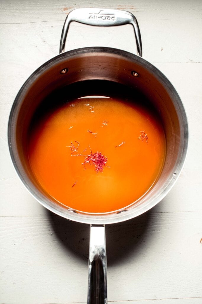 Stock and saffron in small saucepan. 