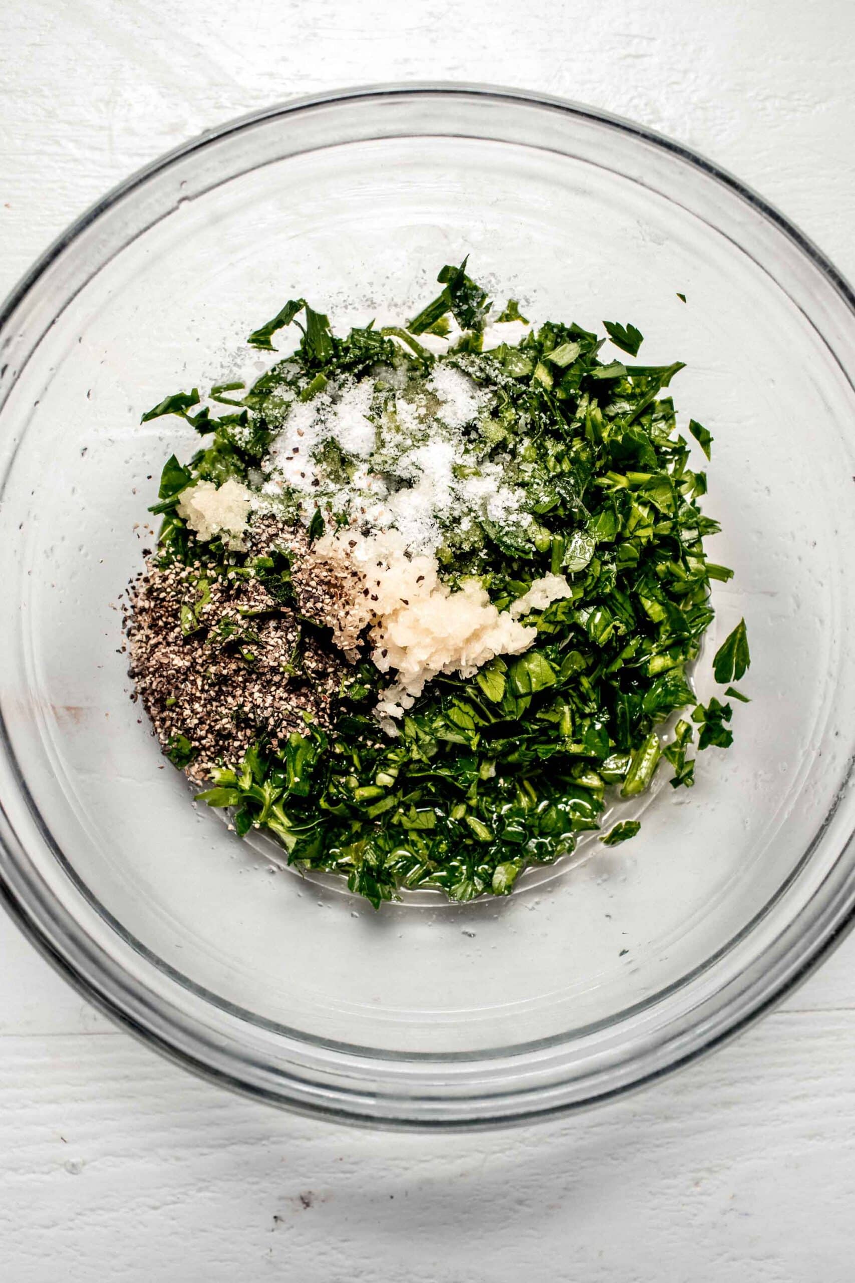 herb blend in small glass bowl.