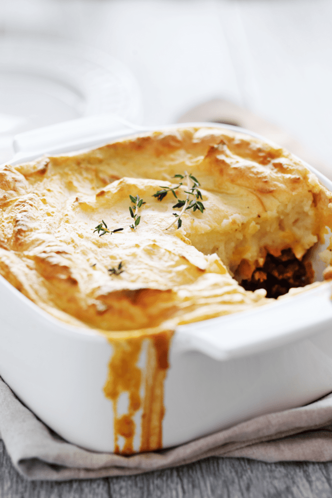 Shepherd's pie in white casserole dish. 