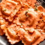 Ravioli in bowl with fork.