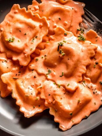 Ravioli in bowl with fork.