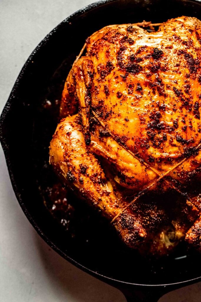 Crispy roast chicken in skillet. 