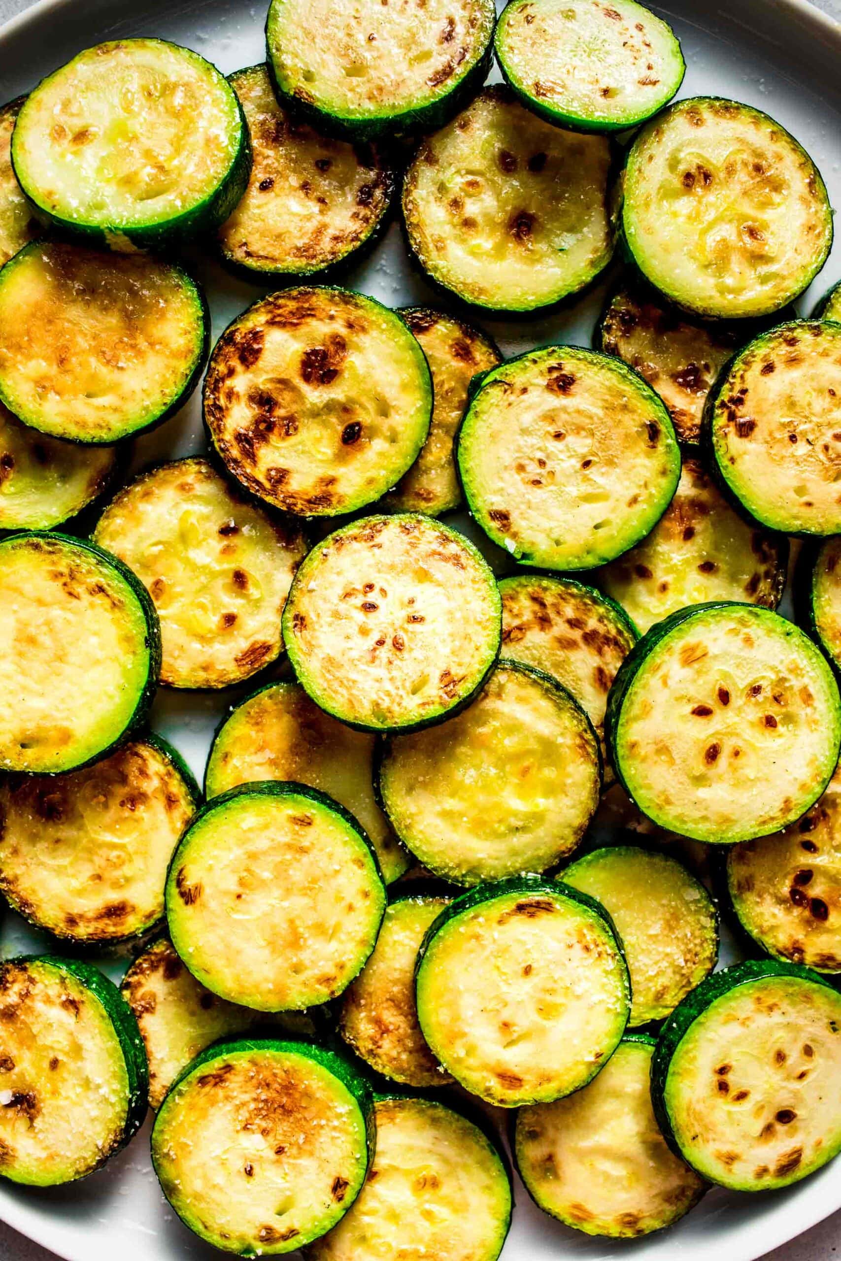 Browned zucchini in skillet. 
