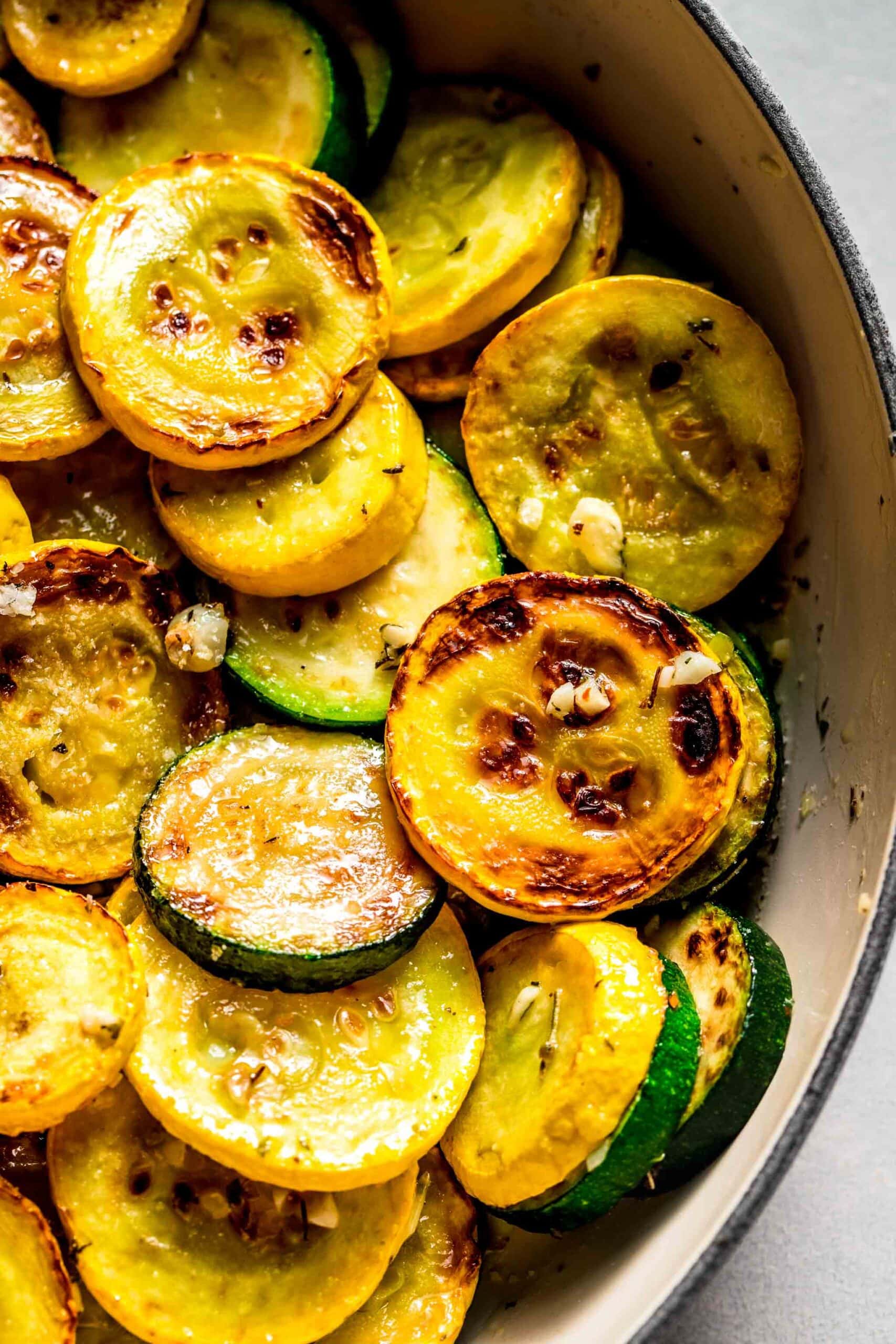 Sauteed zucchini and squash in skillet.