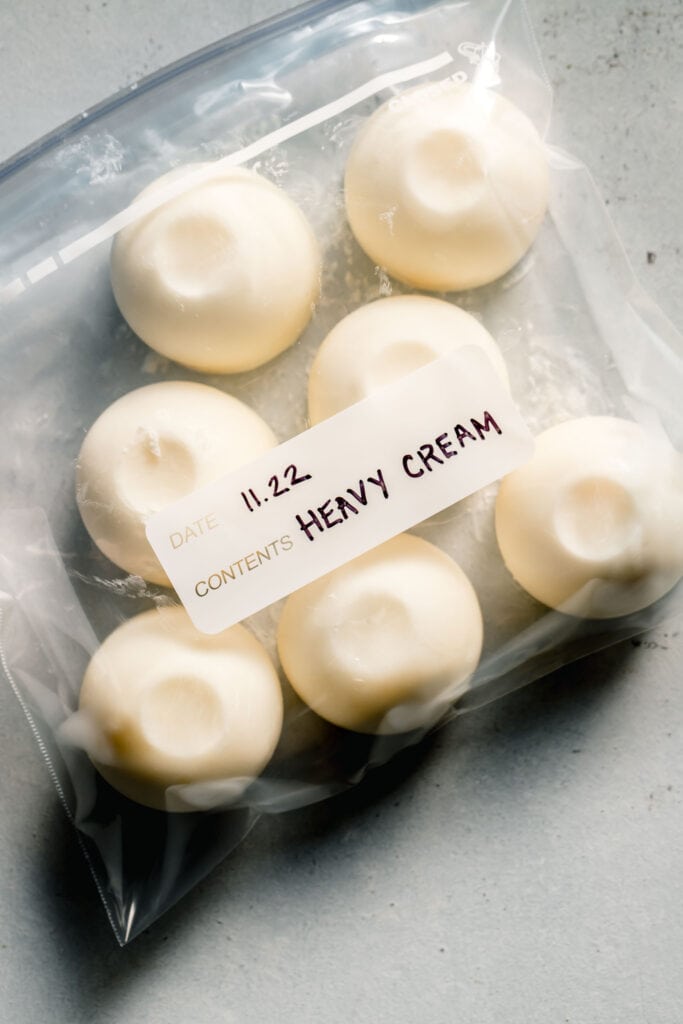 Frozen heavy cream in labeled ziploc bag.