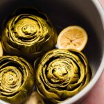 Artichokes in instant pot liner.