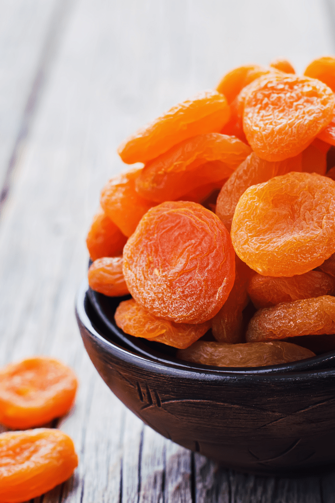 Dried apricots in bowl.