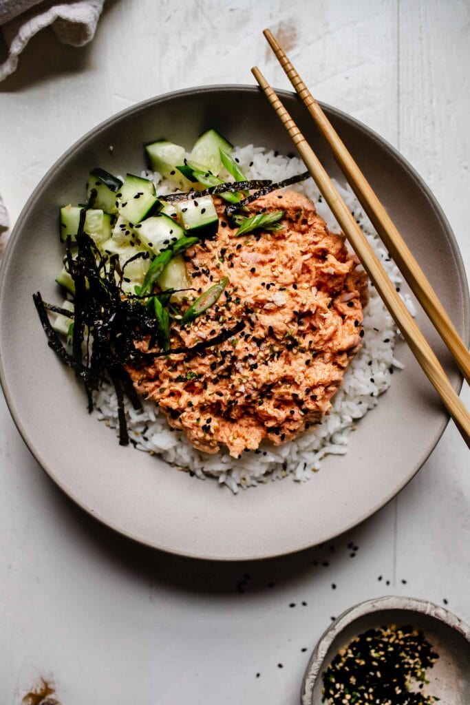 Overhead shot of spicy tuna rice bowl ready to be eaten. 