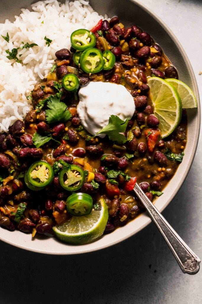 Curry served with dollop of sour cream.