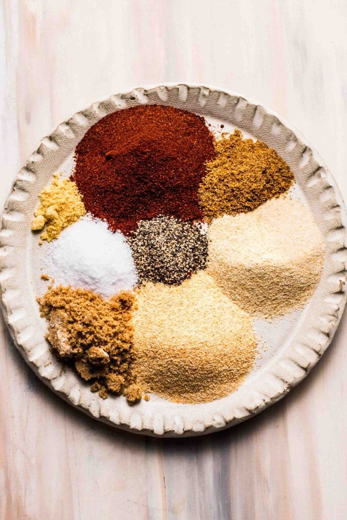 Ingredients for salmon dry rub on plate before stirring.