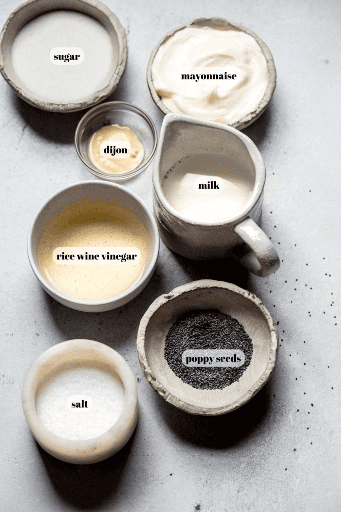 Ingredients for poppyseed dressing labeled on counter.