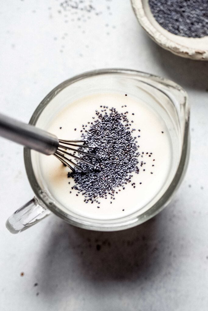 Poppyseeds in measuring cup.