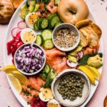 Smoked salmon platter ready to serve with bagels.