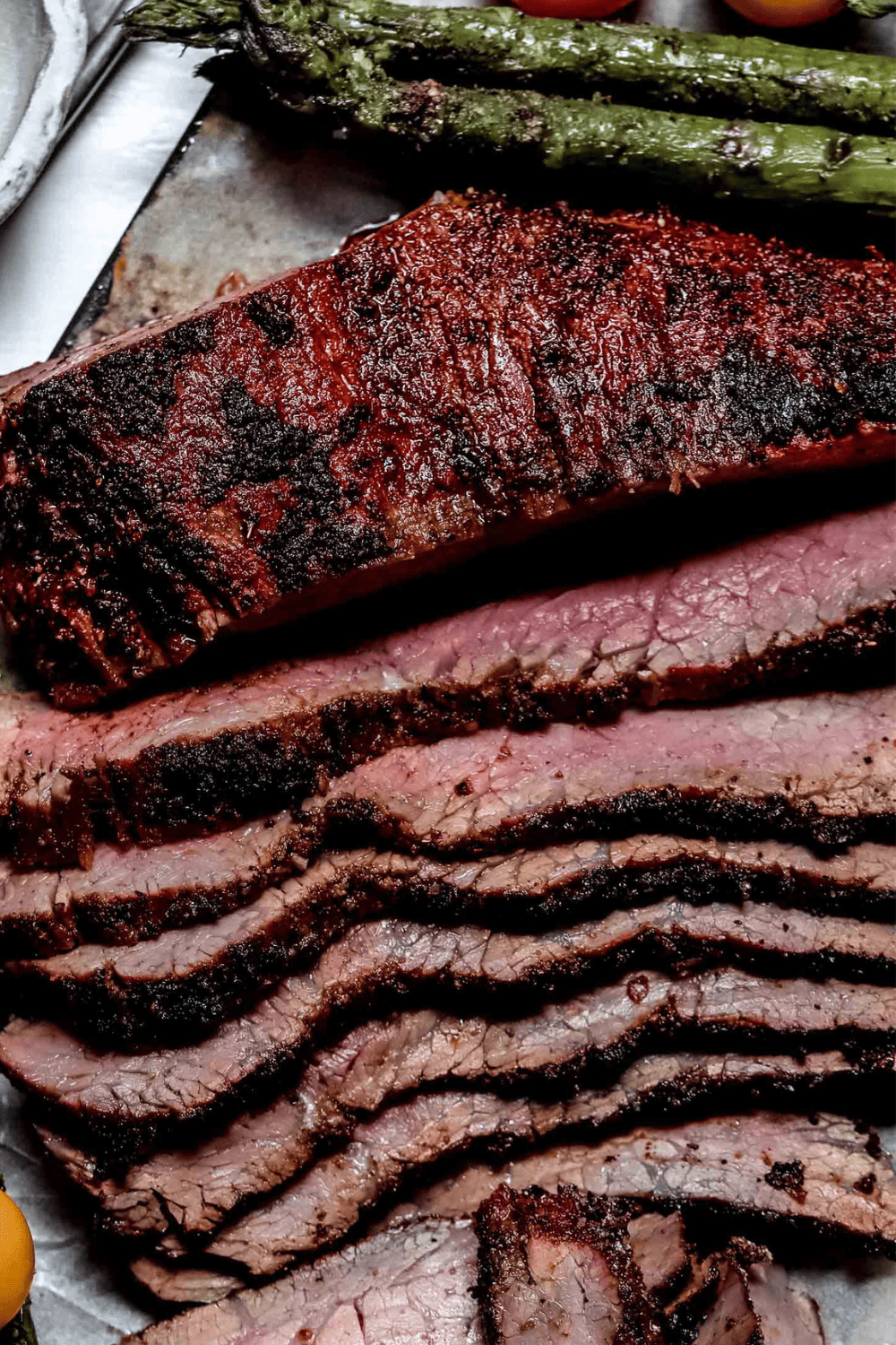 Smoked tri-tip sliced on serving platter.