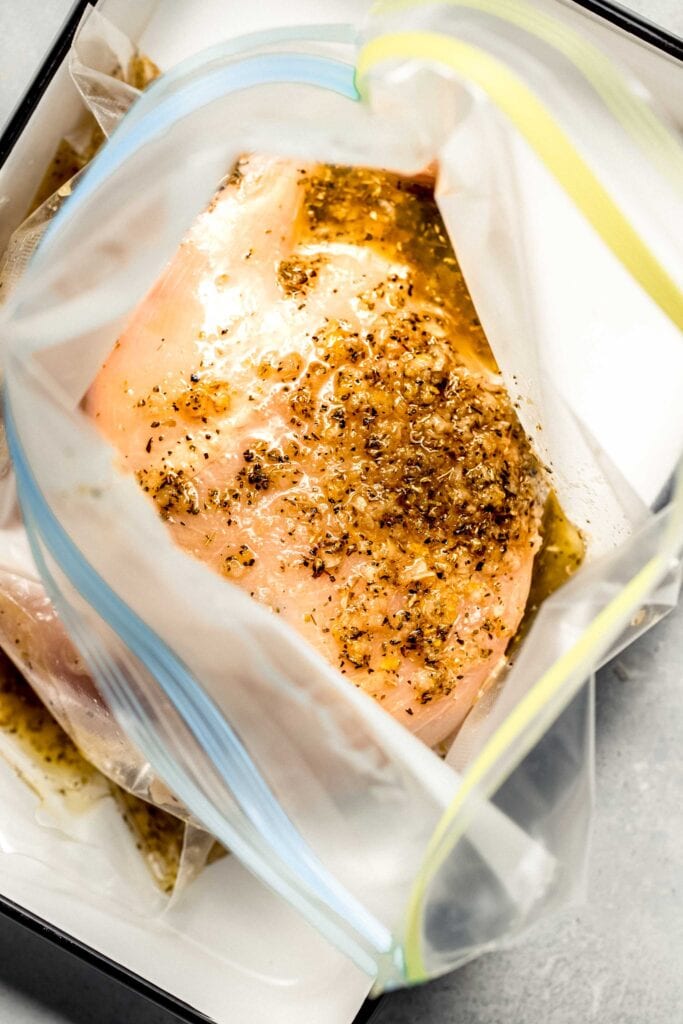 Chicken in large ziploc bag with marinade. 