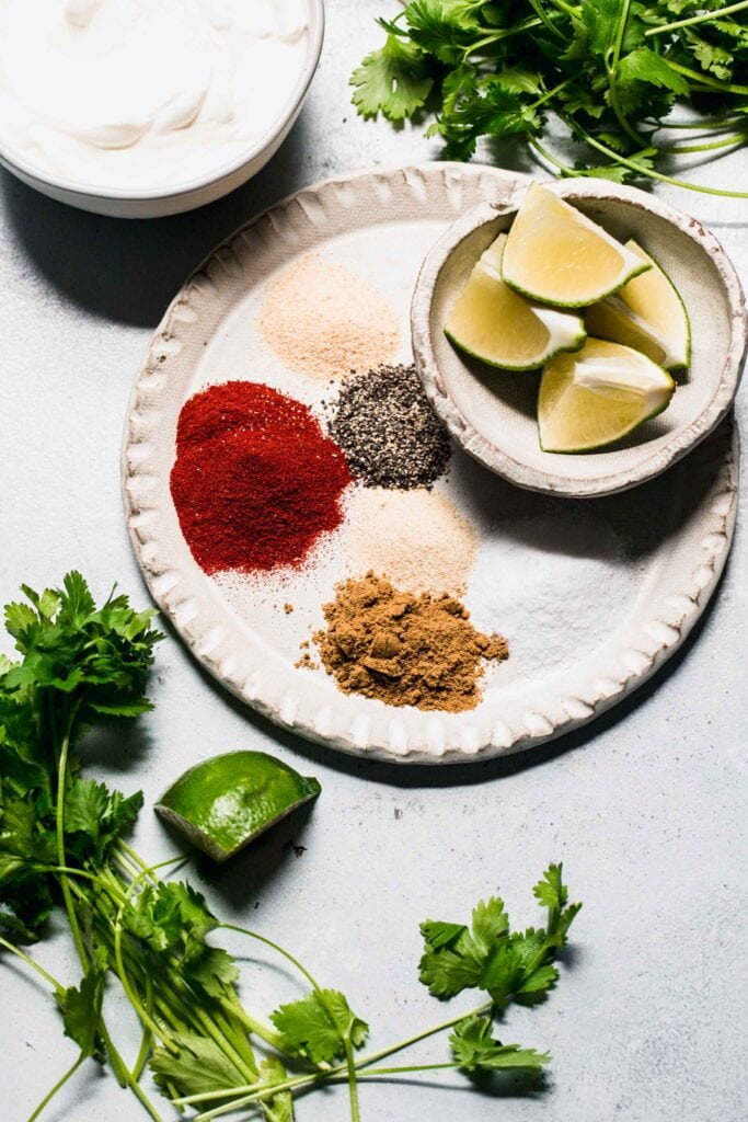Ingredients for greek yogurt southwest dressing on counter. 
