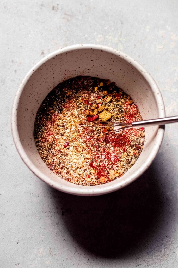 Steak dry rub whisked together in bowl. 