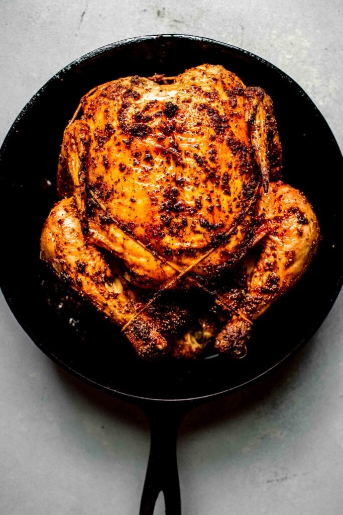 https://www.platingsandpairings.com/wp-content/uploads/2023/11/easy-roasted-chicken-recipe-2-683x1024.jpg