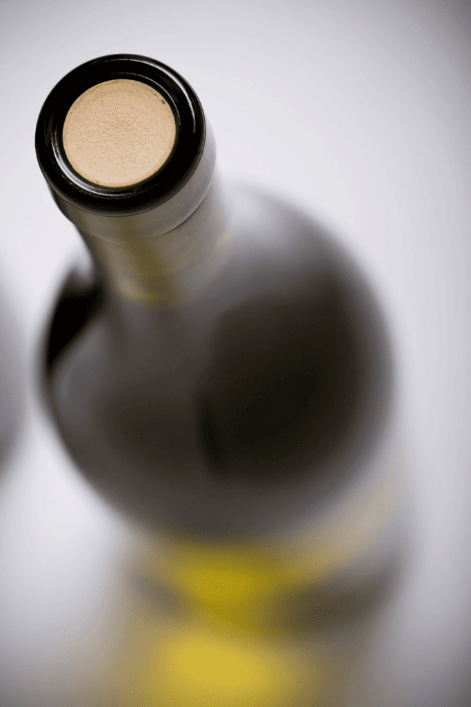 Bottle of white wine with cork. 