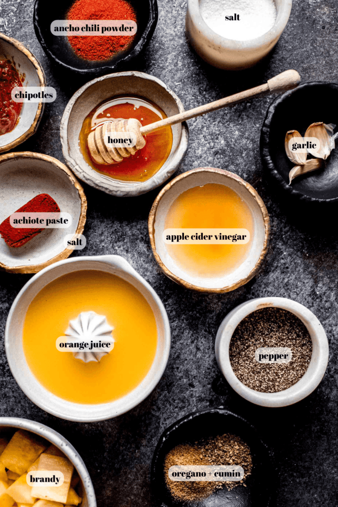 Ingredients for al pastor marinade labeled on counter.