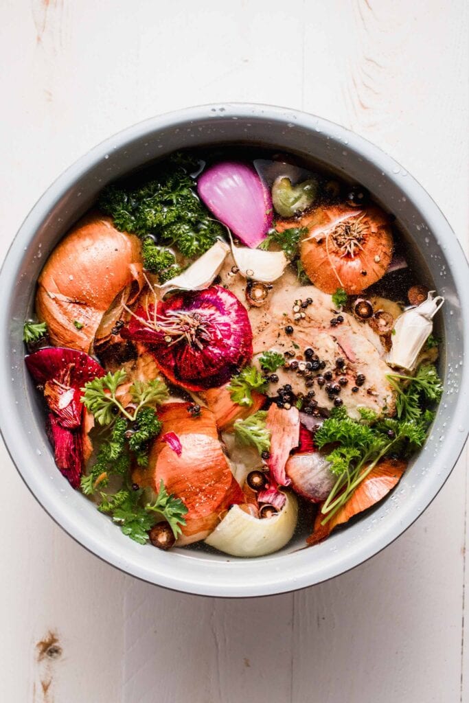 Bone broth ingredients added to instant pot liner. 
