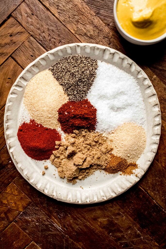 Spice rub ingredients on plate.