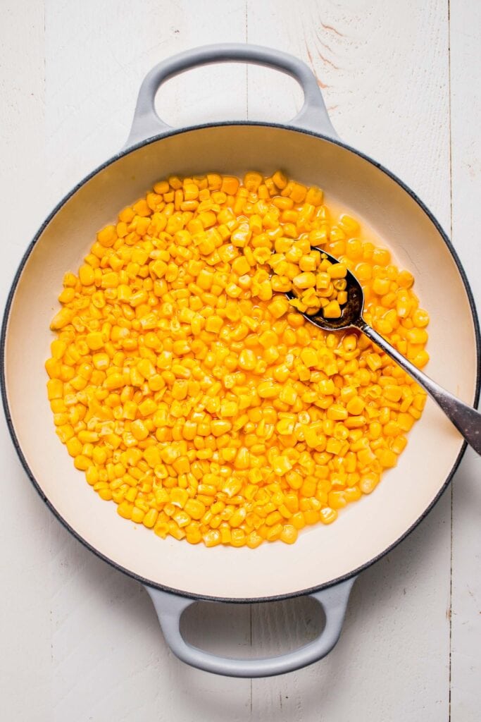 Cooked canned corn in skillet. 