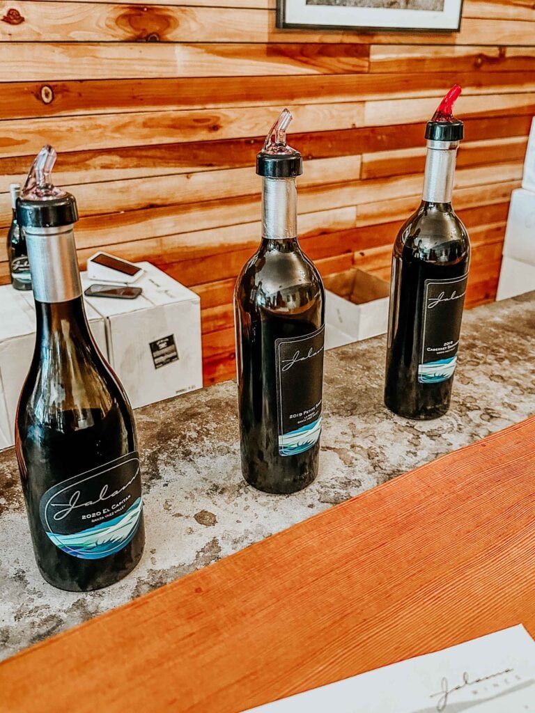 Wine bottles at tasting room.