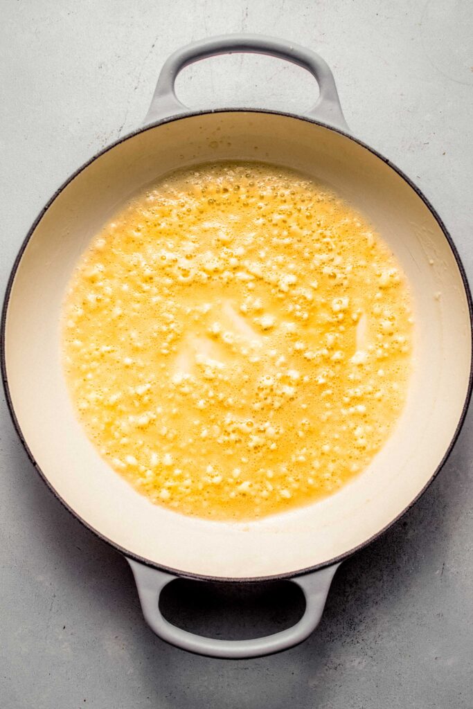 Flour whisked into skillet.