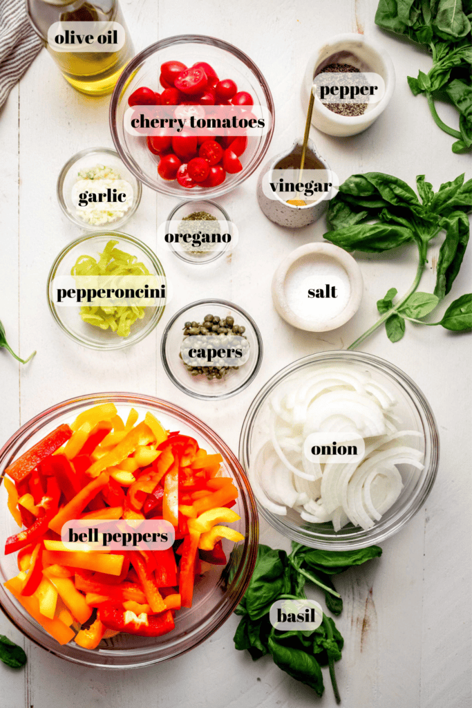 Ingredients for pepperonata labeled on counter. 