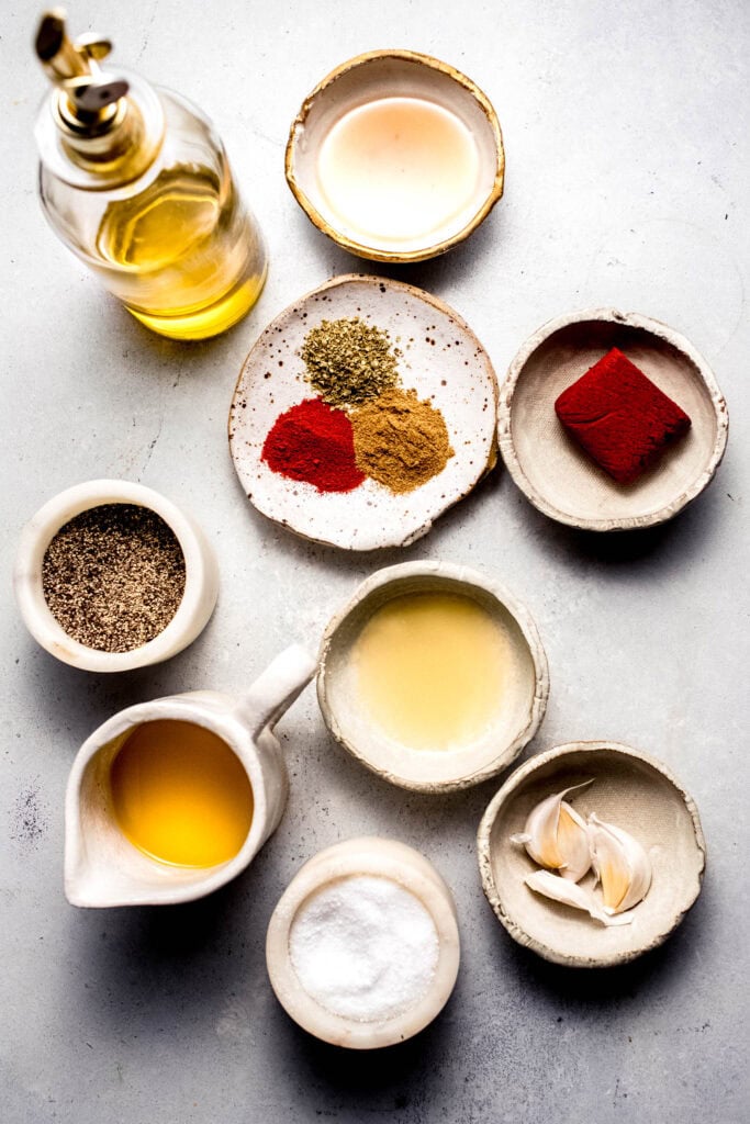 Ingredients for achiote chicken thighs on counter. 