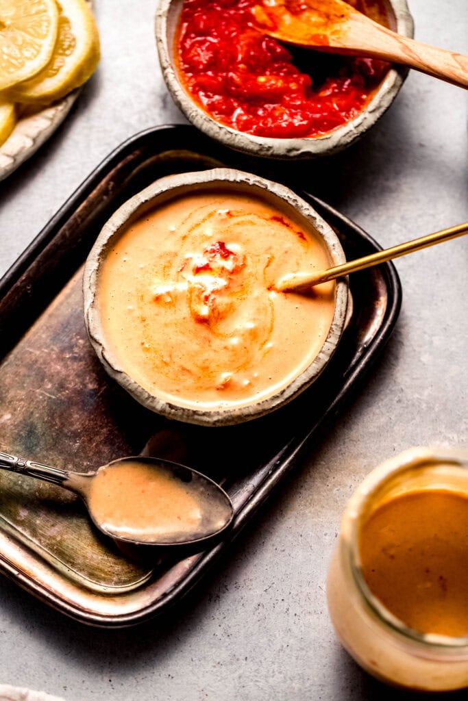 Harissa sauce blended in small bowl. 