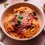 Side view of red wine pasta sauce pasta.