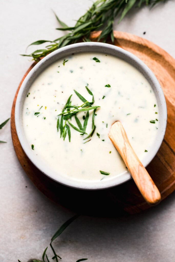 Creamy tarragon sauce in serving bowl.